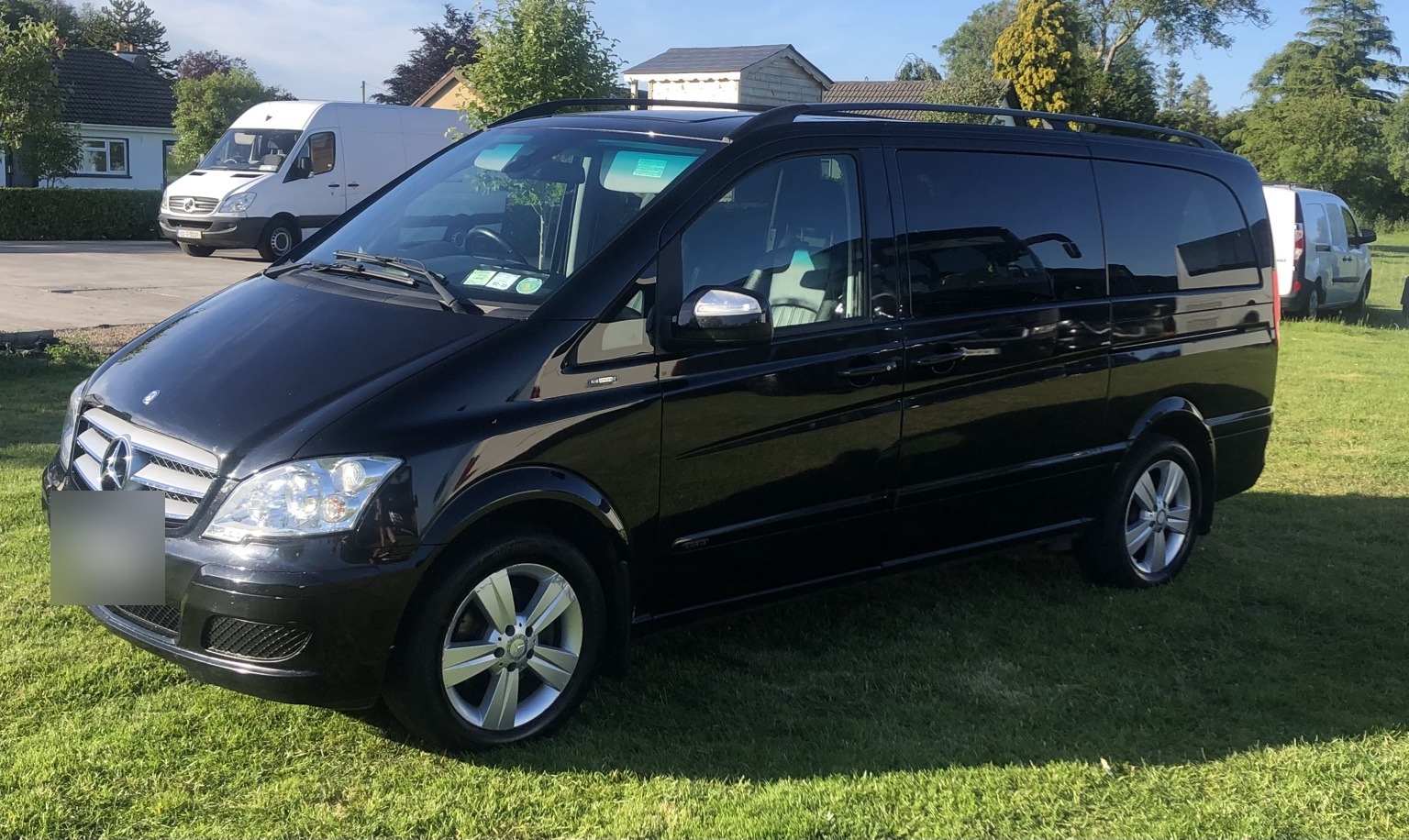 Black Mercedes Viano executive vehicle